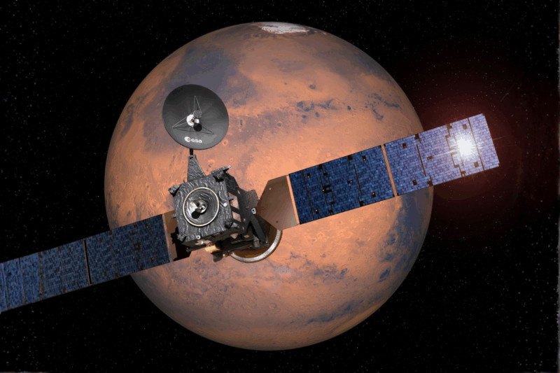 Un impact de météorite dessine des traînées sombres sur les pentes de Mars, révélant un paysage fascinant
